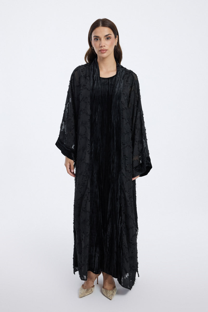 تحميل الفيديو: عباية نسائية بطبقة شفافة وتفاصيل منسوجة