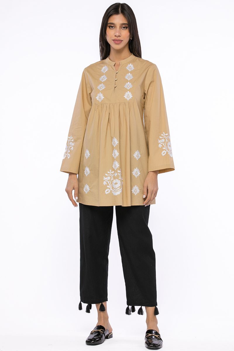 cropped pants with tassels