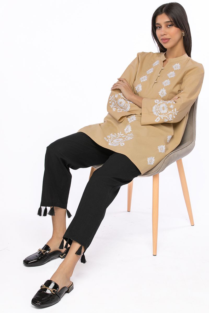 cropped pants with tassels