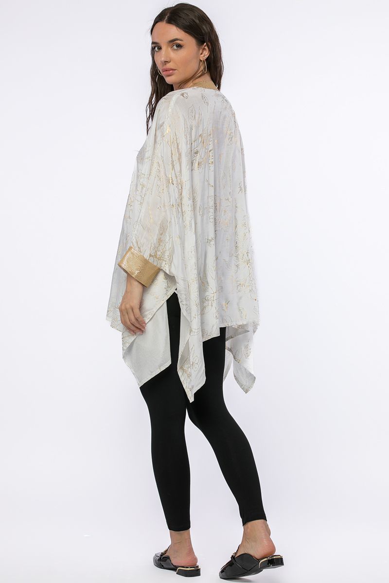 بلوزة غير متماثلة الطول