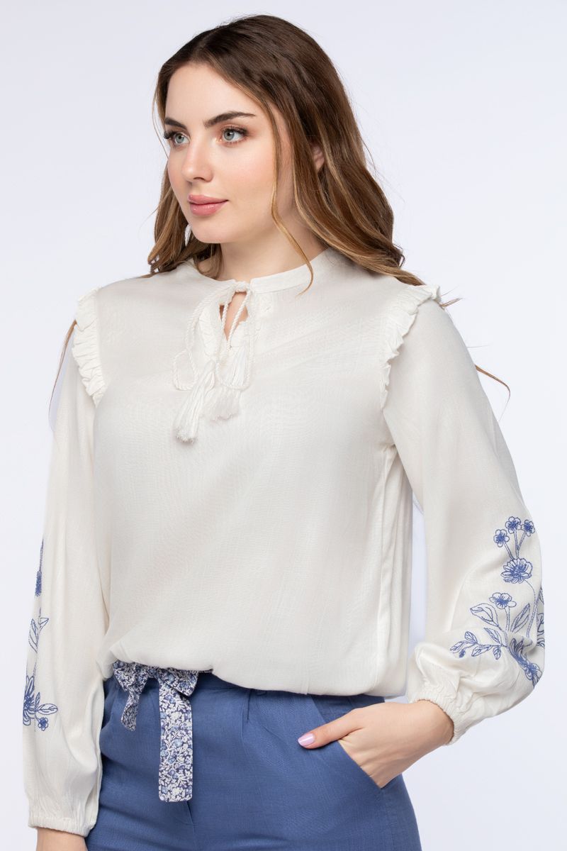 women top with embroidery