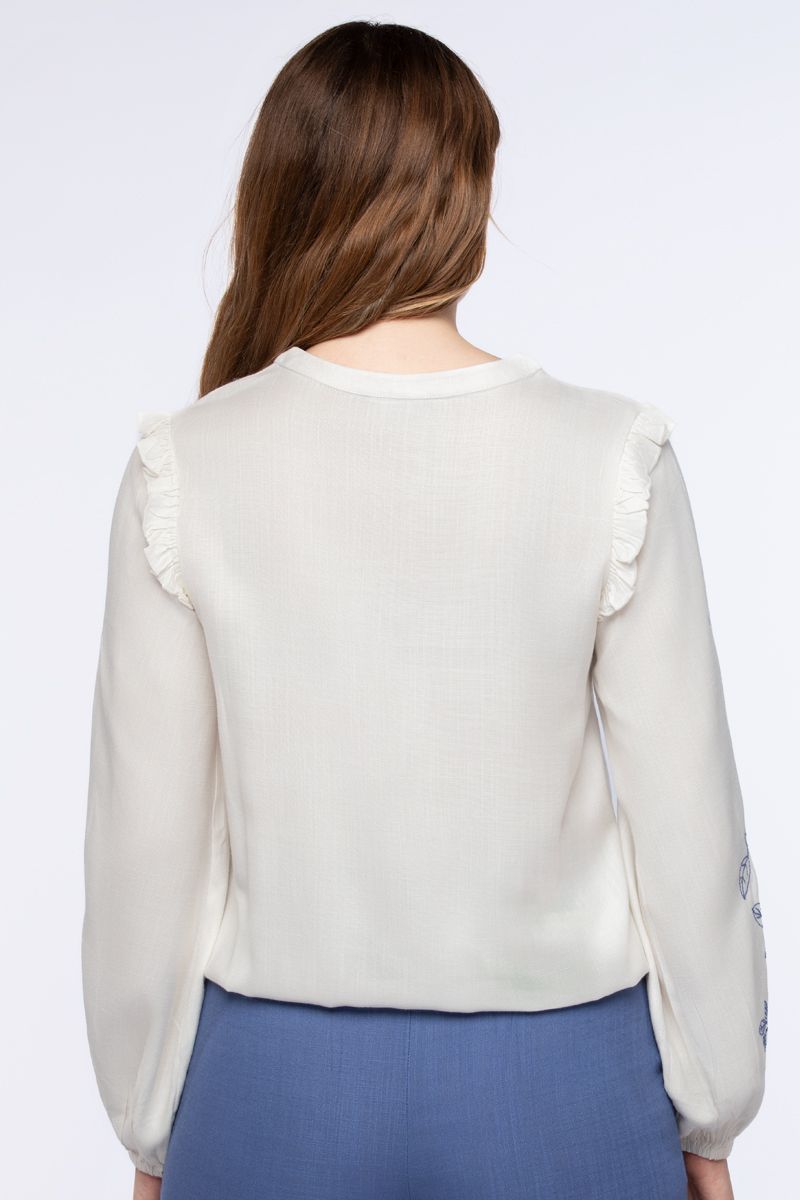 women top with embroidery