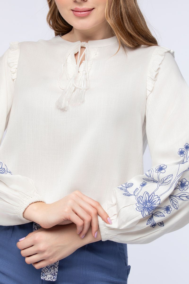 women top with embroidery