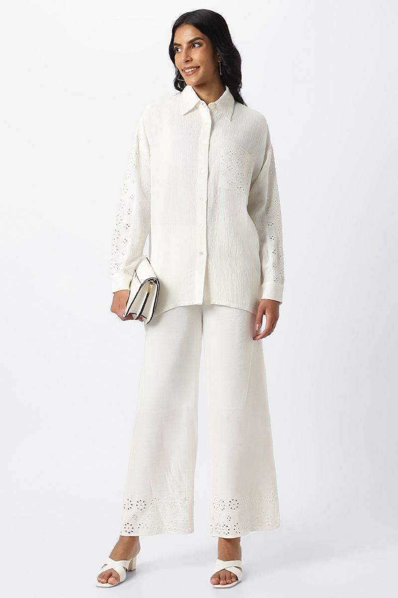 women pants with perforated slots