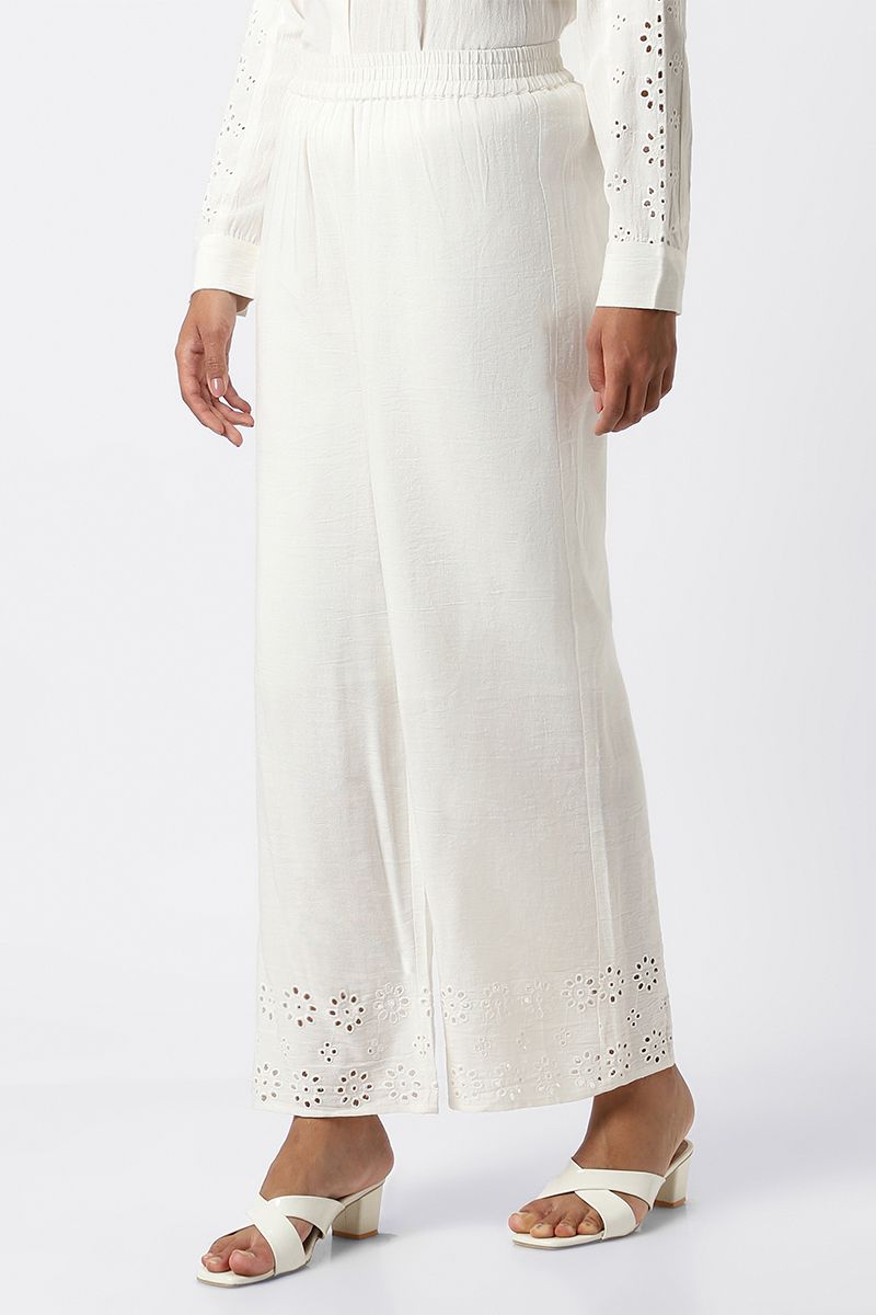 women pants with perforated slots