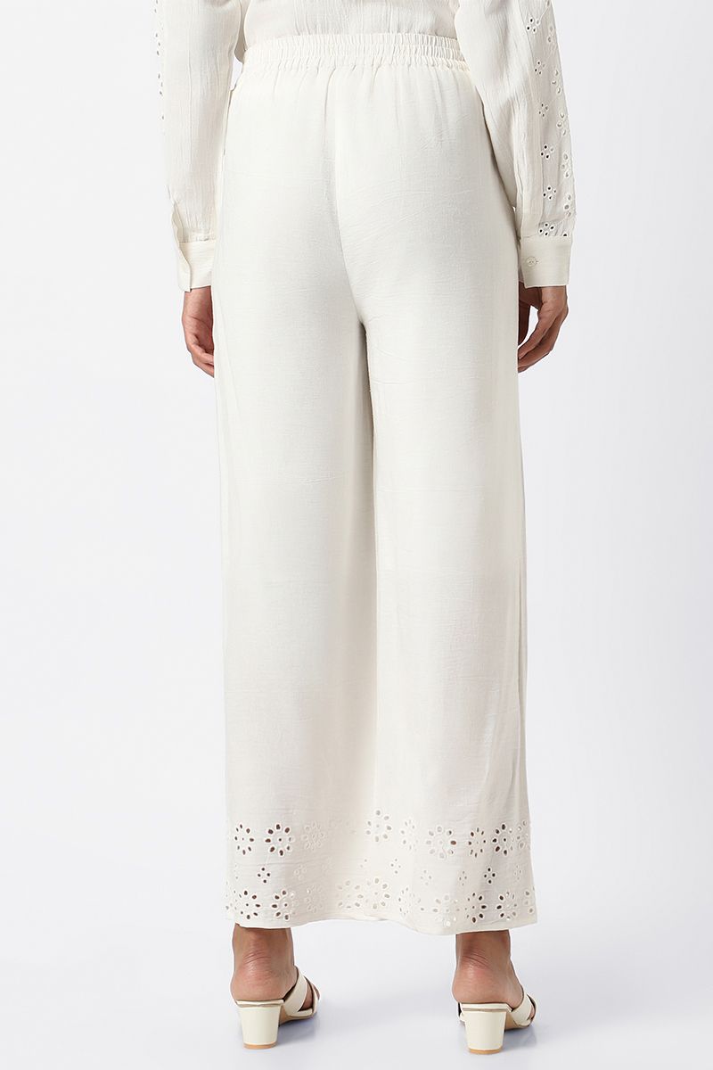 women pants with perforated slots