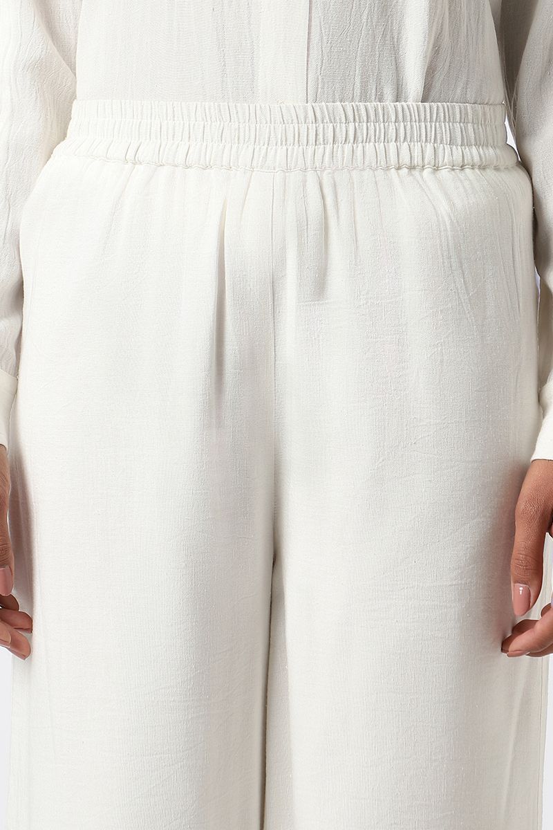 women pants with perforated slots