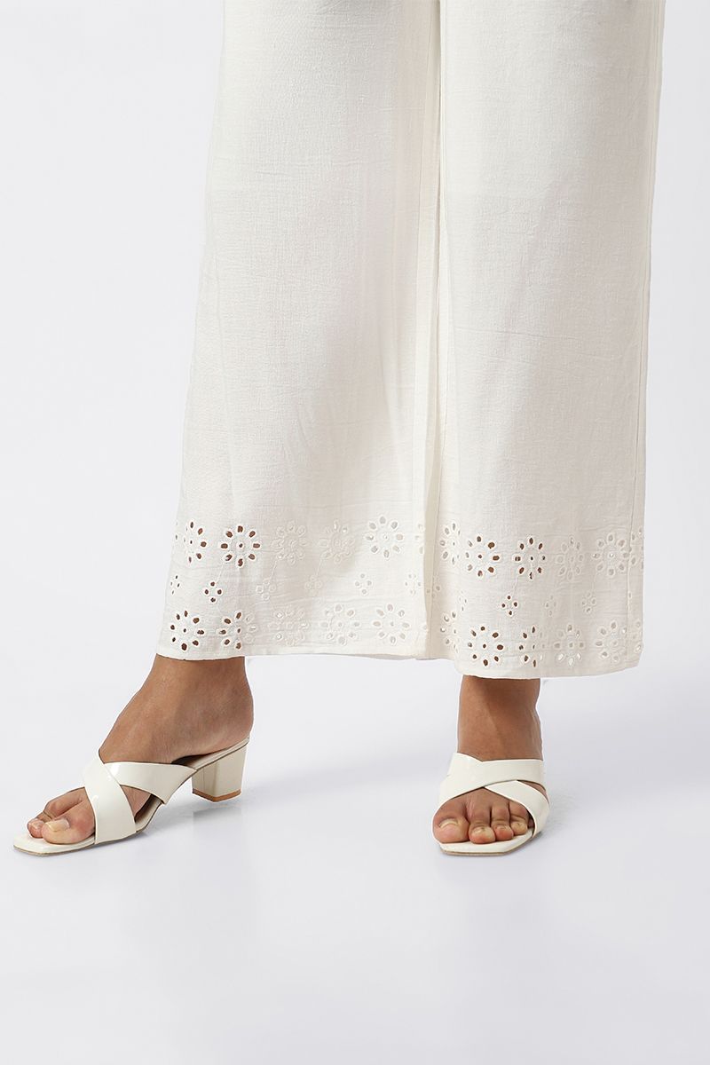 women pants with perforated slots