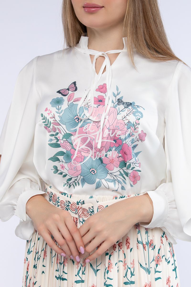 women top with open cut sleeves