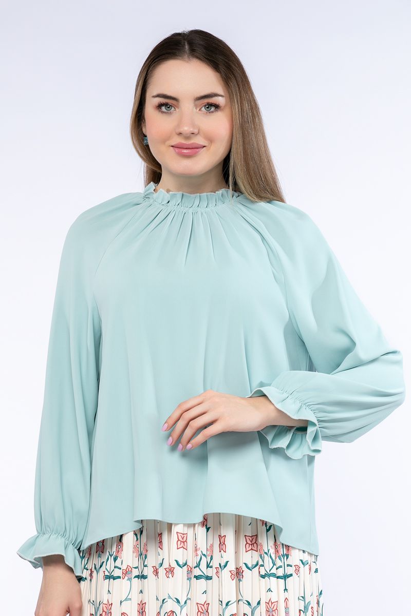 بلوزة نسائية بتفاصيل