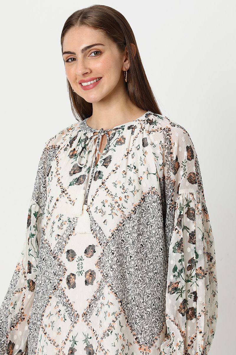 بلوزة نسائية بطبعات ورباط على الرقبة