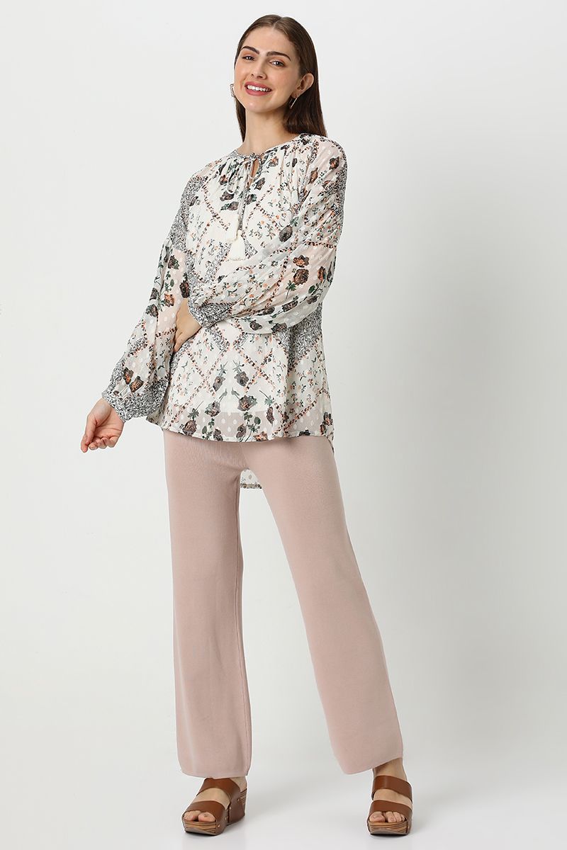 بلوزة نسائية بطبعات ورباط على الرقبة