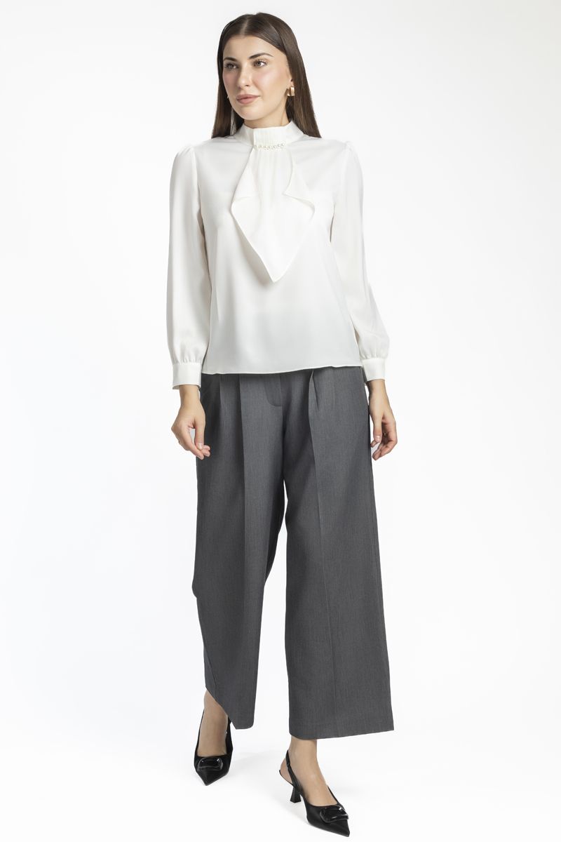 بلوزة نسائية بلون موحد