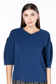 بلوزة نسائية بأكمام منفوخة