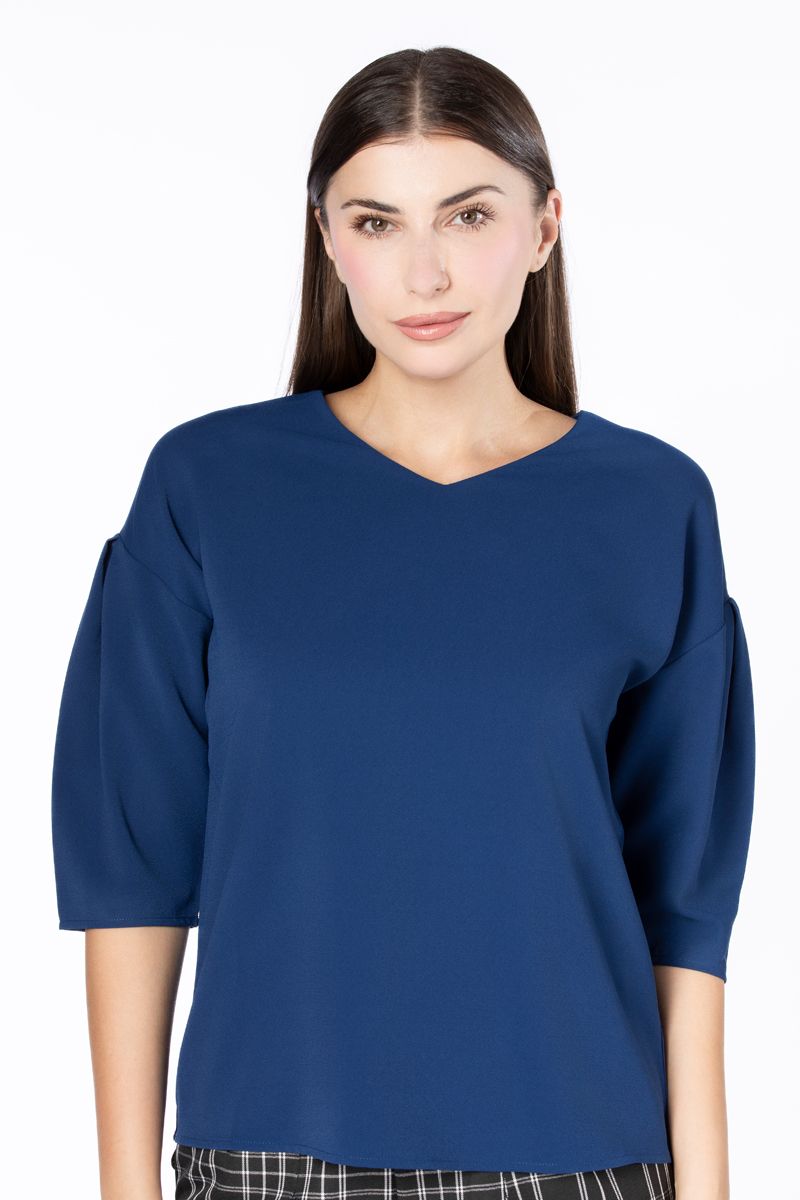 بلوزة نسائية بأكمام منفوخة