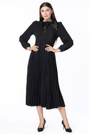 فستان نسائي بكسرات وربطة ببيونة