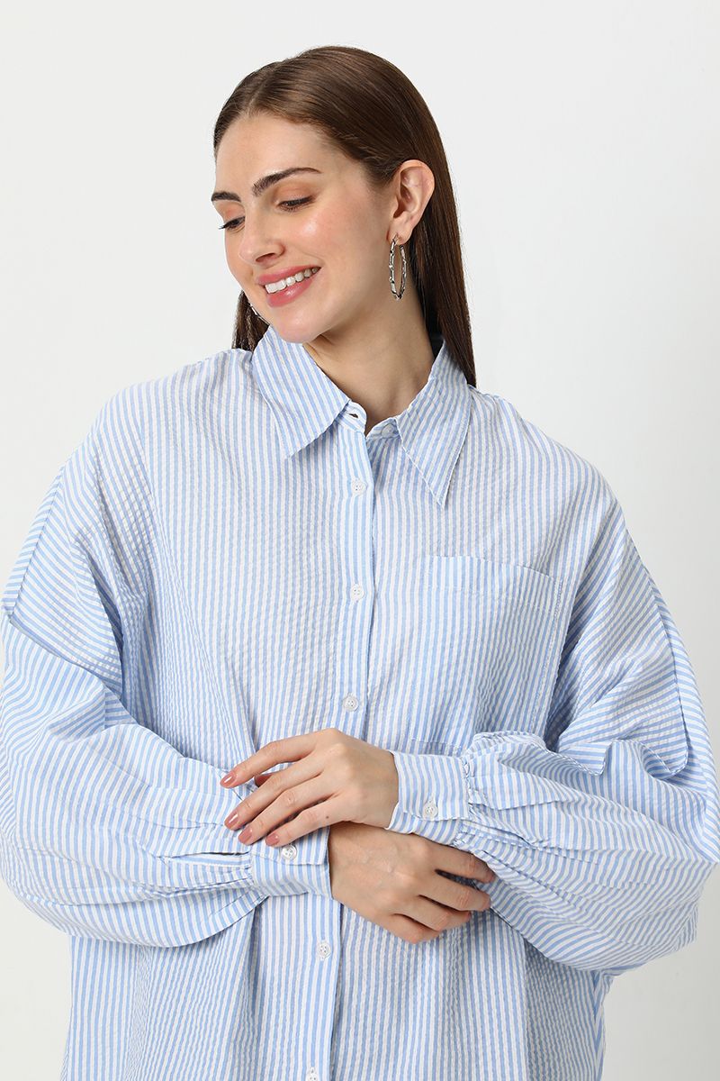 قميص نسائي مخطط بقصة فضفاضة