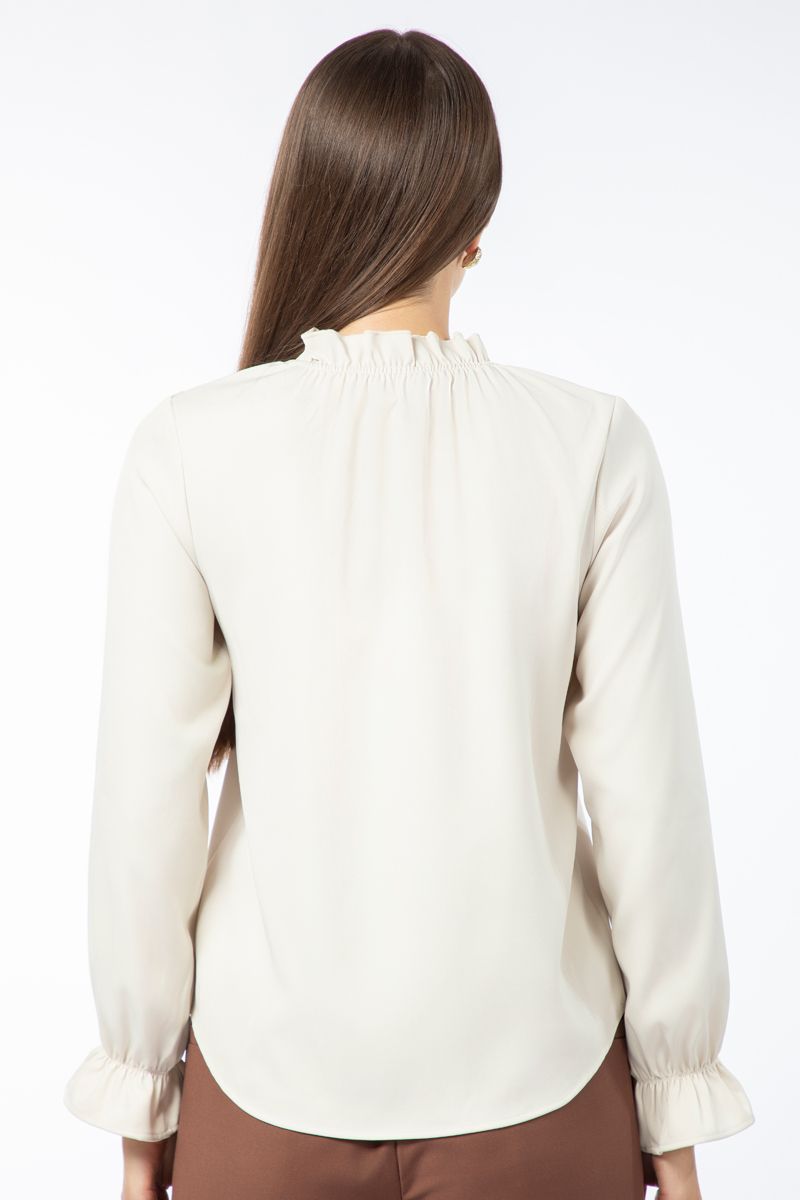 بلوزة نسائية بلون موحد وياقة مكشكشة