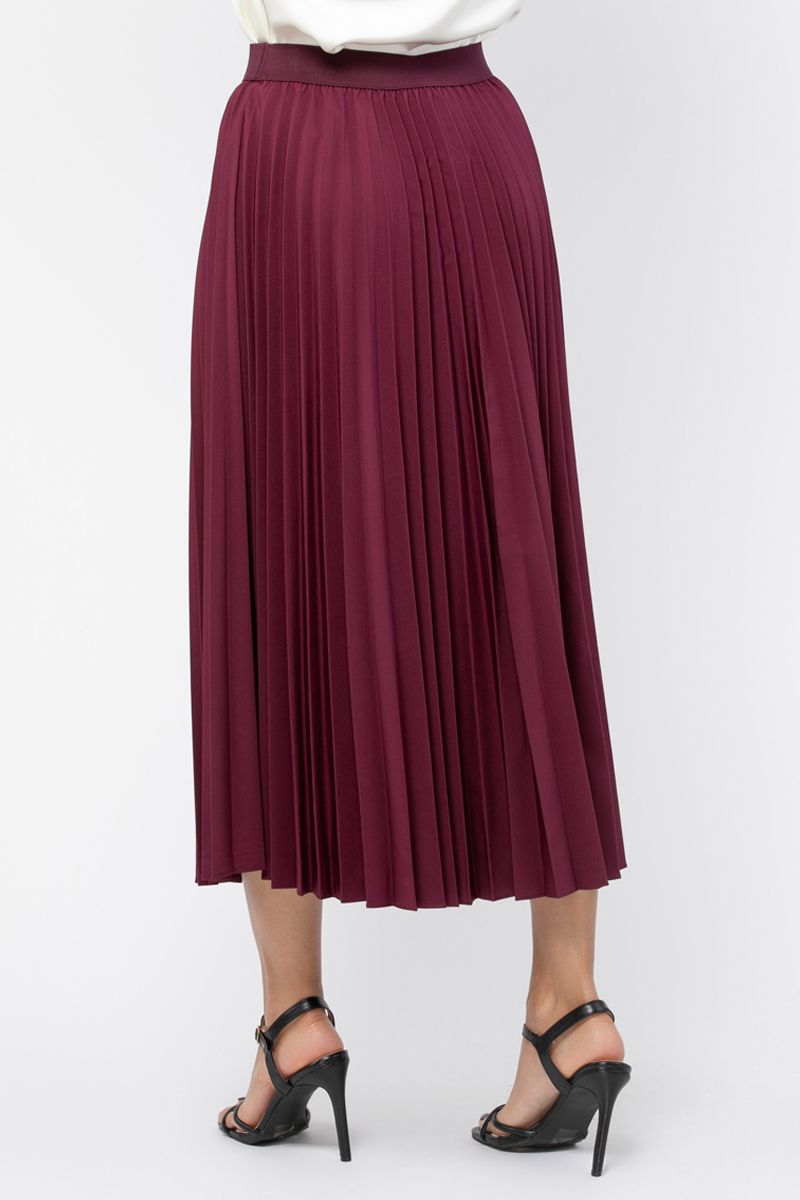 تنورة نسائية بلون موحد ونمط كسرات