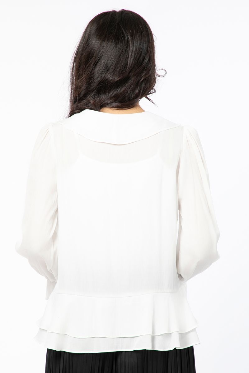 بلوزة نسائية مكشكشة