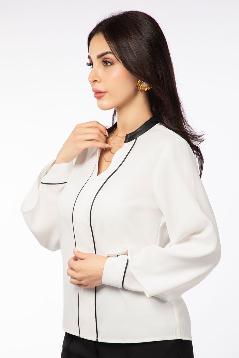 بلوزة نسائية بخطوط