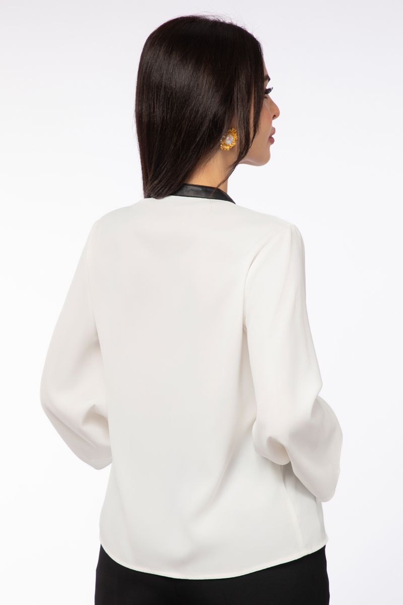 بلوزة نسائية بخطوط