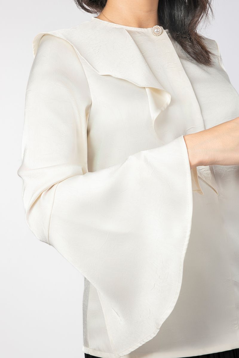 بلوزة نسائية مكشكشة