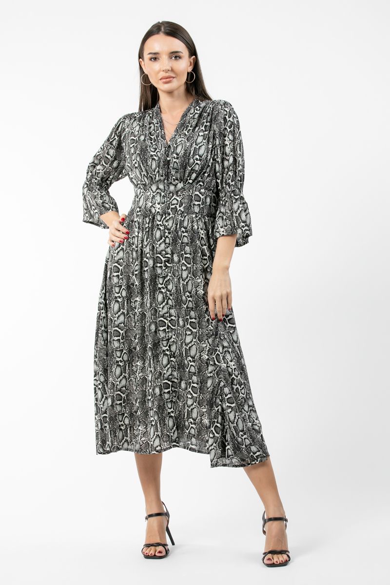 فستان نسائي بنمط قميص وطبعات