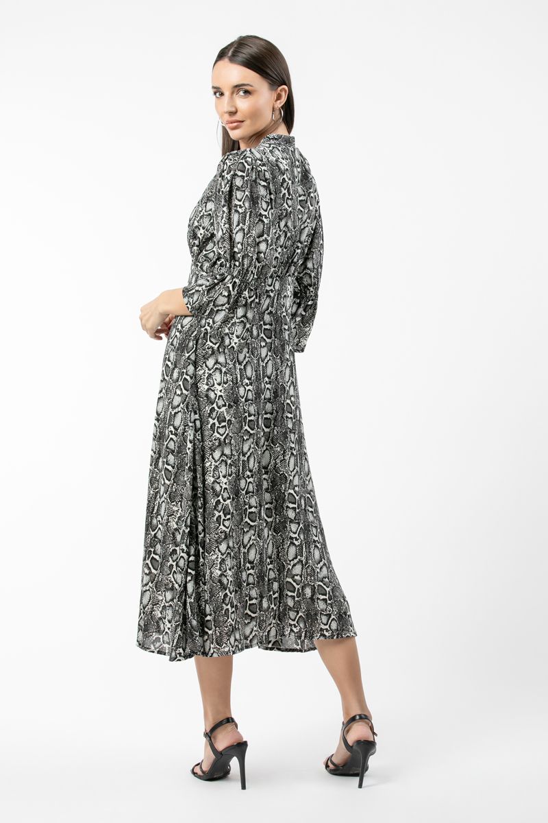 فستان نسائي بنمط قميص وطبعات