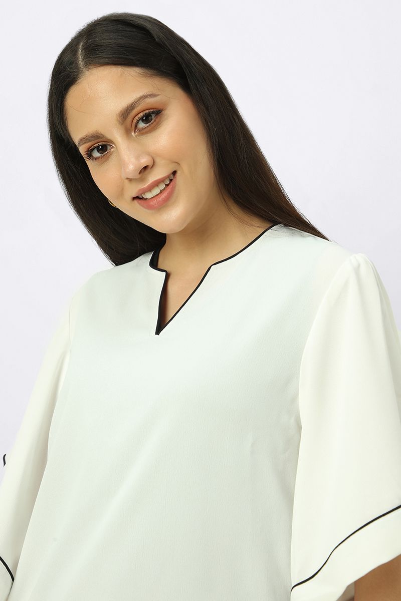 بلوزة نسائية بأكمام عريضة واسعة