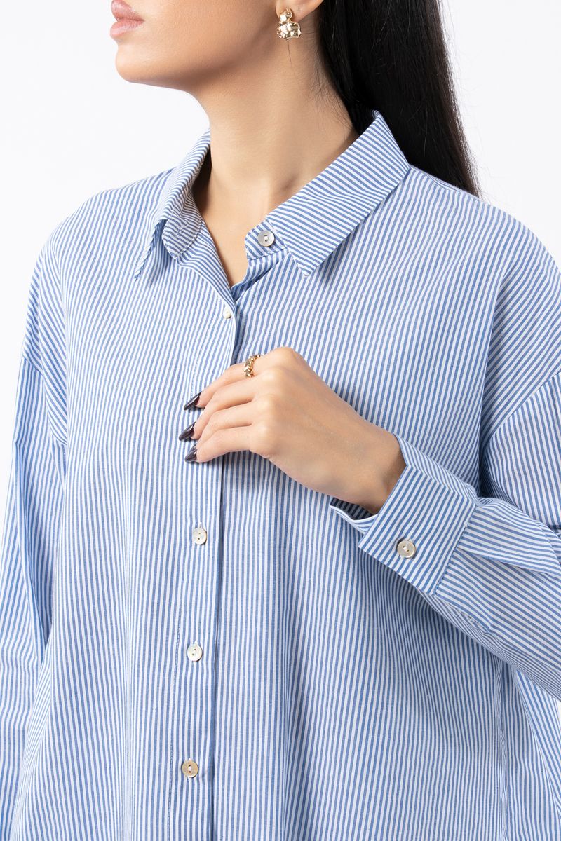 قميص نسائي مخطط غير متماثل الطول