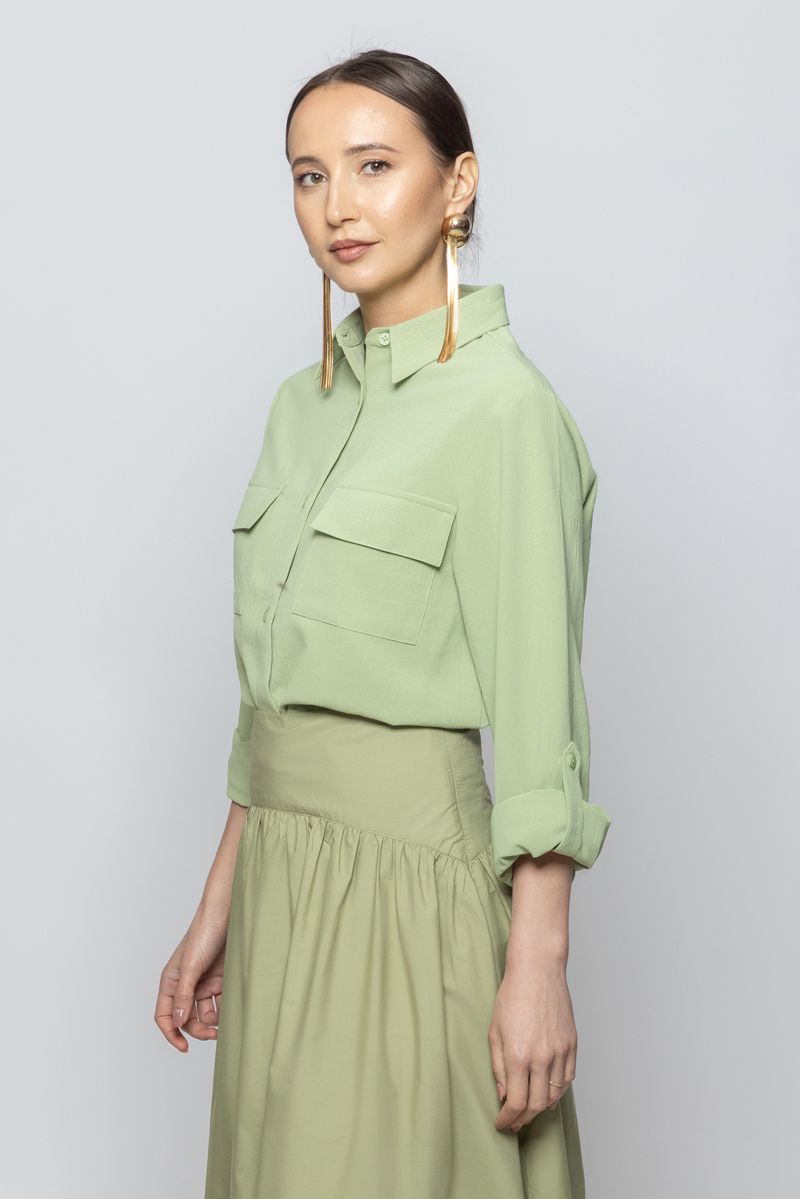 قميص نسائي بأكمام طويلة ولون سادة