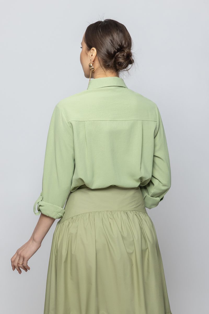 قميص نسائي بأكمام طويلة ولون سادة