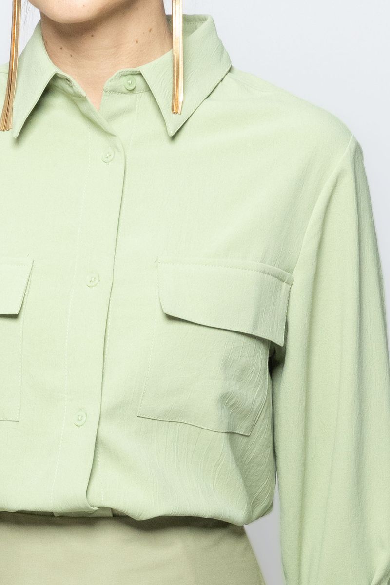 قميص نسائي بأكمام طويلة ولون سادة