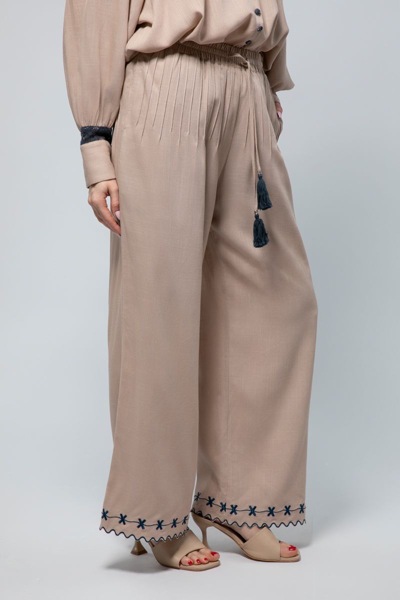 Flowing Wide-Leg Pants - A Fusion of Comfort and Detail