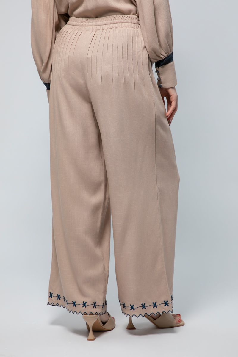 Flowing Wide-Leg Pants - A Fusion of Comfort and Detail