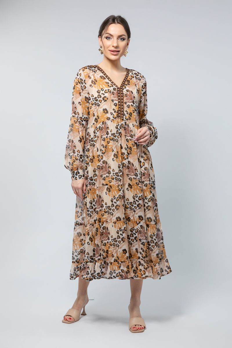 فستان طويل بأكمام طويلة وقصّة فضفاضة- طبعة ناعمة وتفاصيل راقية