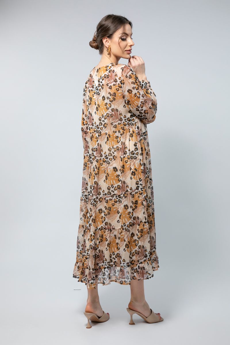 فستان طويل بأكمام طويلة وقصّة فضفاضة- طبعة ناعمة وتفاصيل راقية