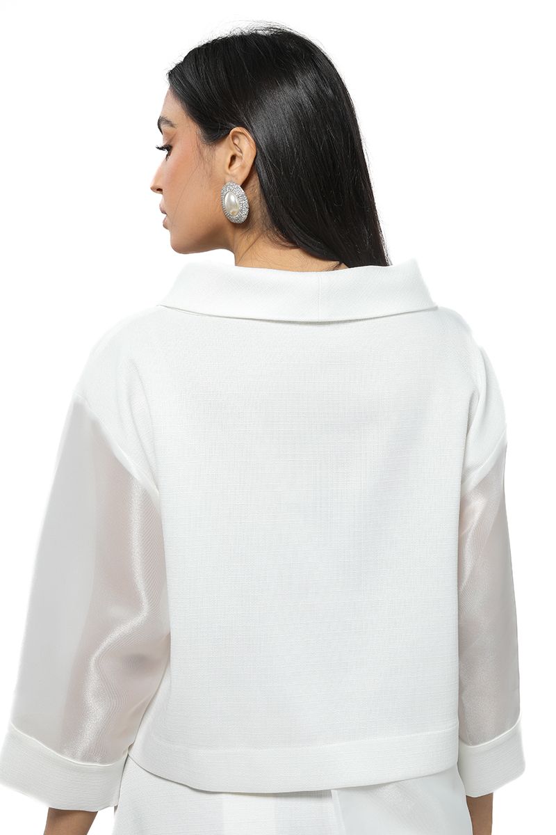 women top with floral ornaments