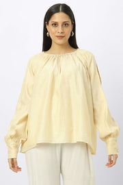 women top with slashed sleeves and back strap
