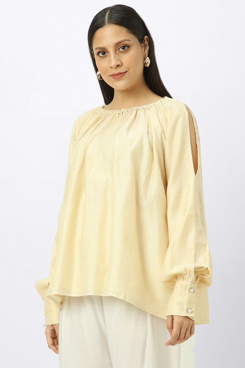 women top with slashed sleeves and back strap