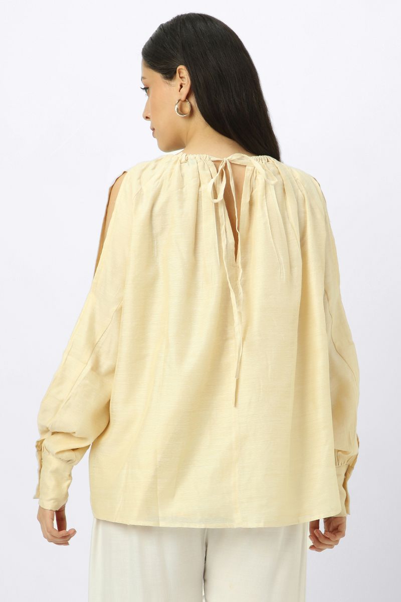 women top with slashed sleeves and back strap