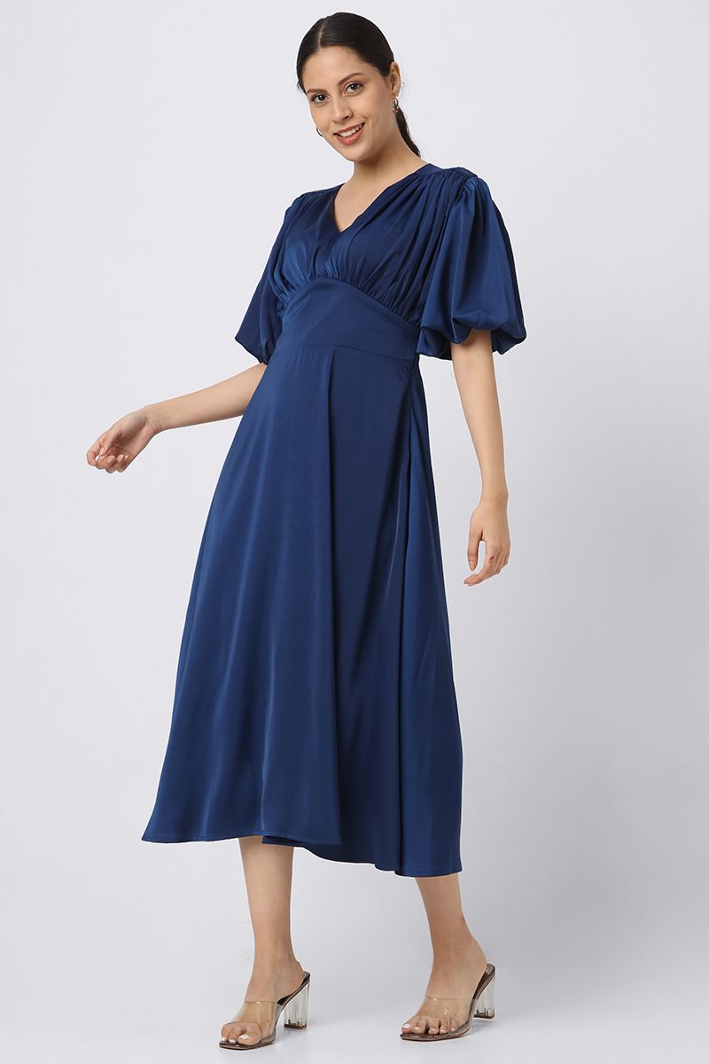 solid colored women dress with puffed sleeves
