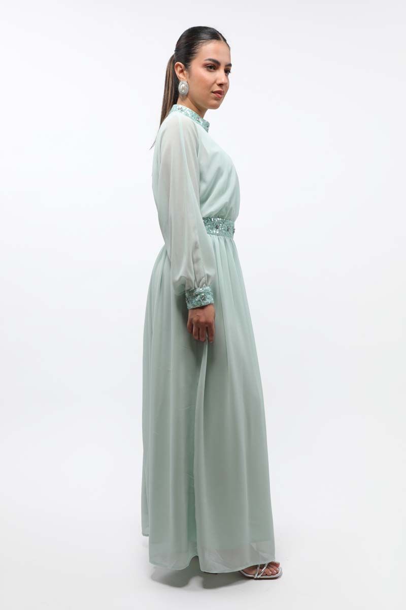 فستان نسائي ماكسي بتفاصيل ترتر