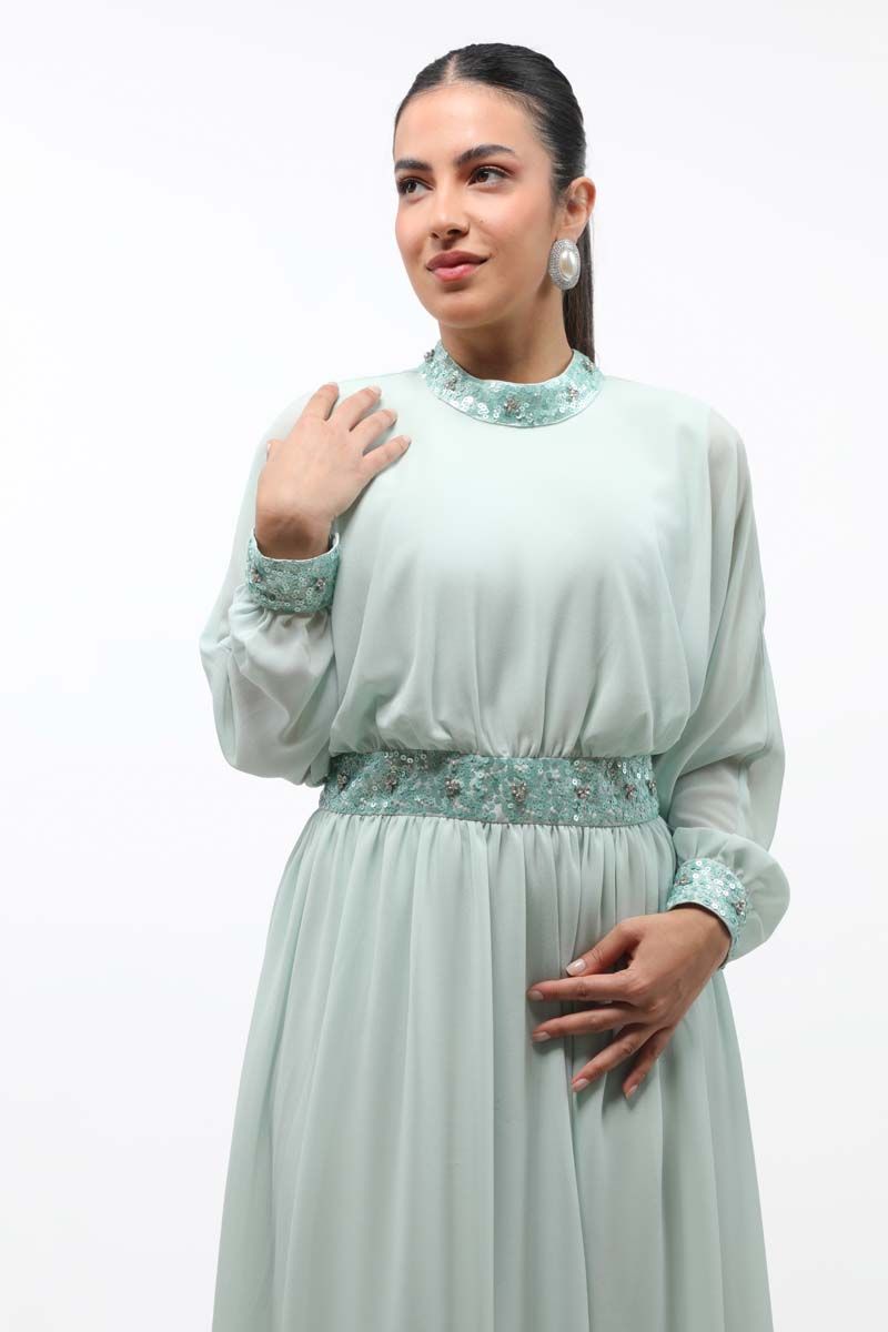 فستان نسائي ماكسي بتفاصيل ترتر