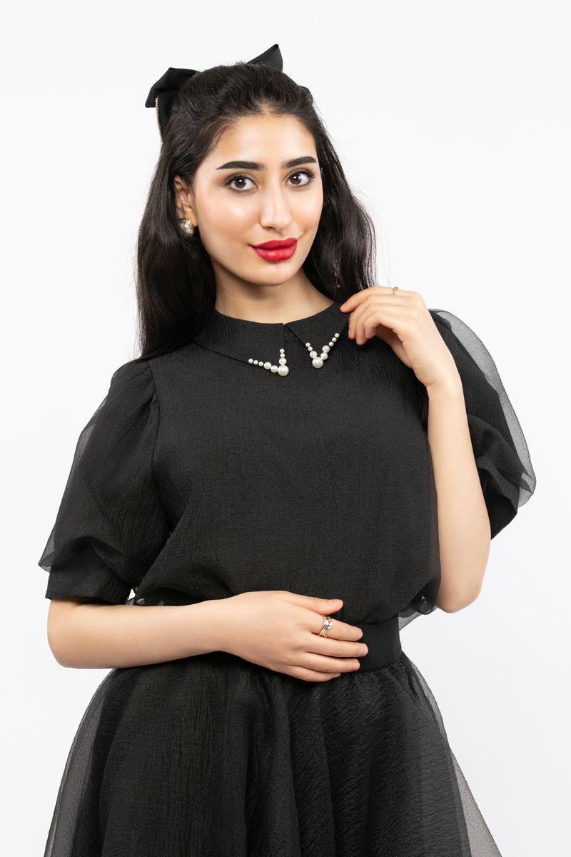 women top with puffed organza sleeves