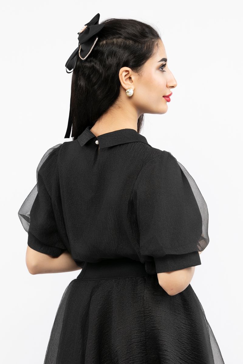 women top with puffed organza sleeves