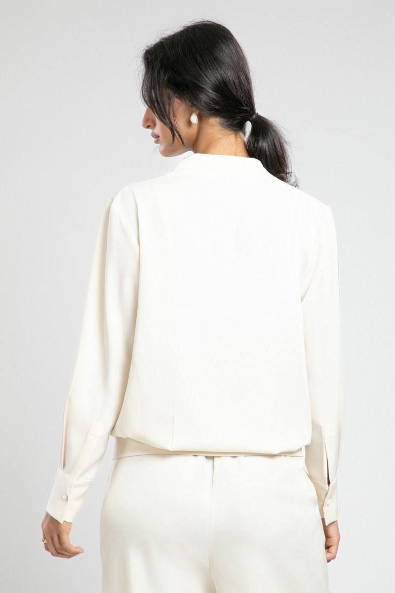 Wrap Style Blouse with Buttoned Hem