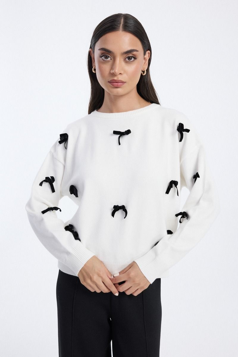 knit blouse with bow embellishments