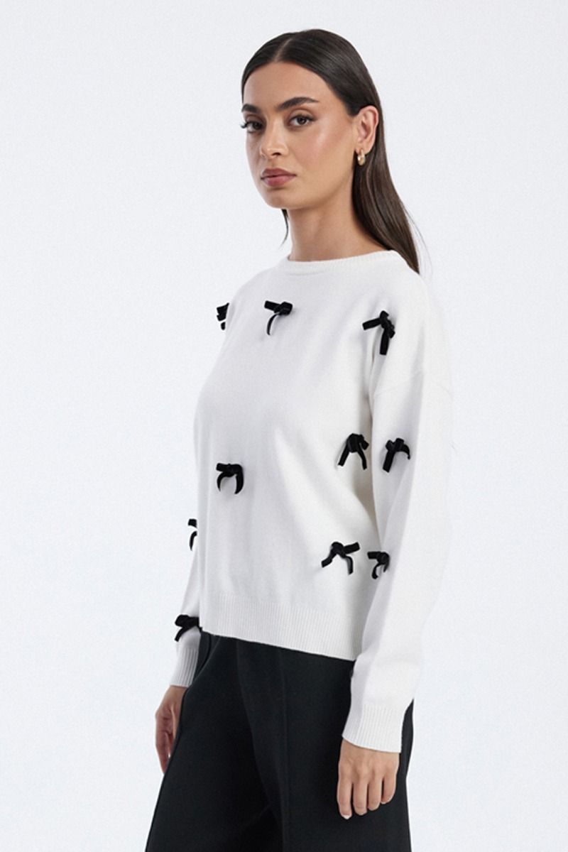 knit blouse with bow embellishments